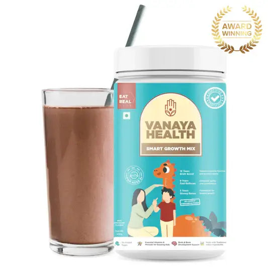 Vanaya Health Smart Growth Mix container with a glass of chocolate shake on a white background